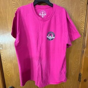 Pink Graphic Short Sleeve T-Shirt with a graphic of a Jeep on the Beach